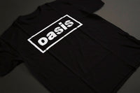 Oasis - White Logo T-Shirt (Black) - Noise In Stereo